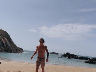 skinny teen gets horny on the public beach