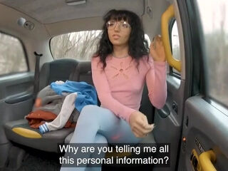 Skinny brunette rocks fat cock in the car