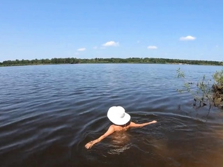 Blonde Solo Nudist Shows Off Tattoos by the River