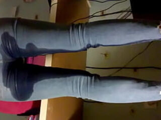 Emma pissing and working in tight jeans