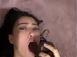 Latina teen deepthroats a thick dildo