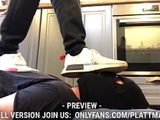 Hard trampling on the head of the slave