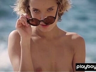 Naked blonde Russian MILF Oksana Chucha wants to bask some vitamin D