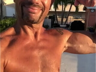 MAXXX LOADZ FLEXING BY THE POOL ON A SUNNY DAY