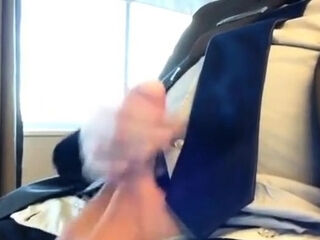 Suited Silver Fox Jerks Off Solo