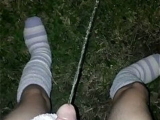 fluffy socks tease - wearing my fluffy protective socks while pissing outside at night in the cold