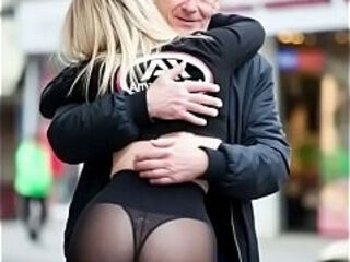 Grandpa hugs a blonde and gropes her ass in tight leggings.
