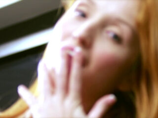 Bombshell redhead girl with nice round tits indulges in a sensual solo masturbation