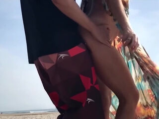 My adorable wife with ABS sucks my dick hard on a beach
