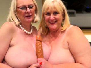 Busty blonde mistress fucks lesbian slave with big cock