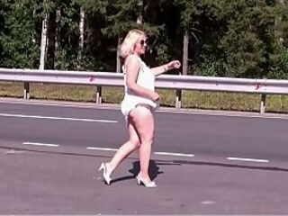 Hot MILF on the road seduces with her ass