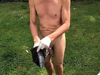 naked pathetic white slave during outdoor party in penis cage enjoy playing with nettles and his uncut dick, CMNM