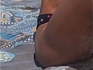 It was so hot at the beach that I had to take off my bikini.
