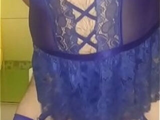 Crossdresser in blue lingerie fucks her ass with a dildo