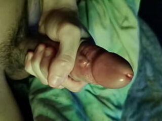 Heavy streams of precum from a large overexcited cock