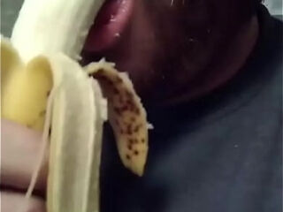 Guy deepthroats a banana pt 3