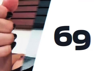 Busty brunette ladyboy in black lingerie strokes her hairy