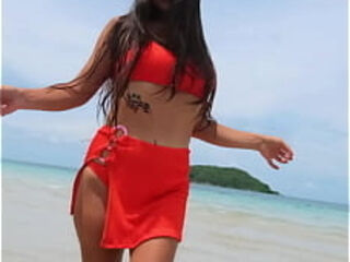 Orange sexy bikini fun on the tropical beach