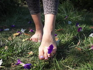 Crushing Flowers Barefoot In The Grass